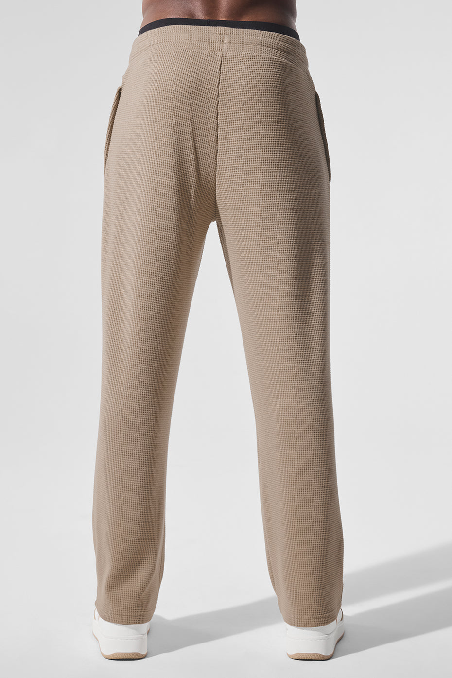 Model wearing Elevate waffle pants paired with a casual top for a comfortable look