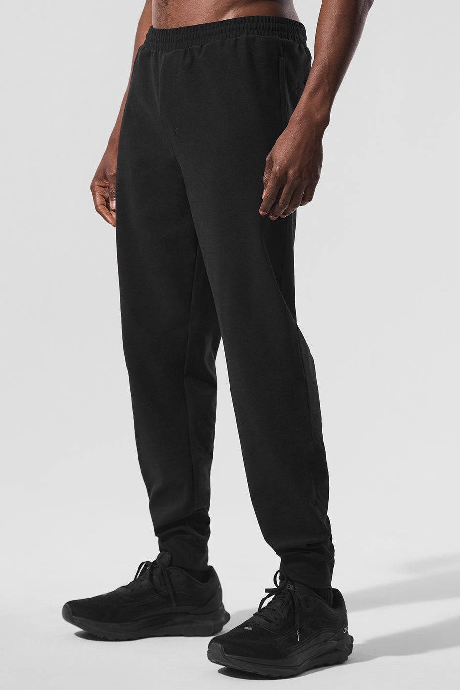 Back view highlighting the design and comfort of gym joggers for men.