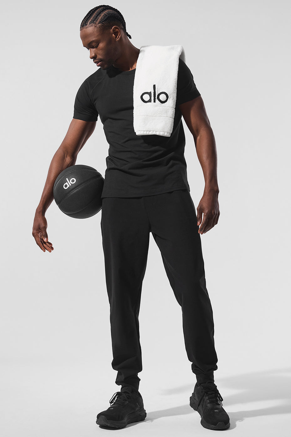 Front view of Conquer Max performance joggers for men in black.