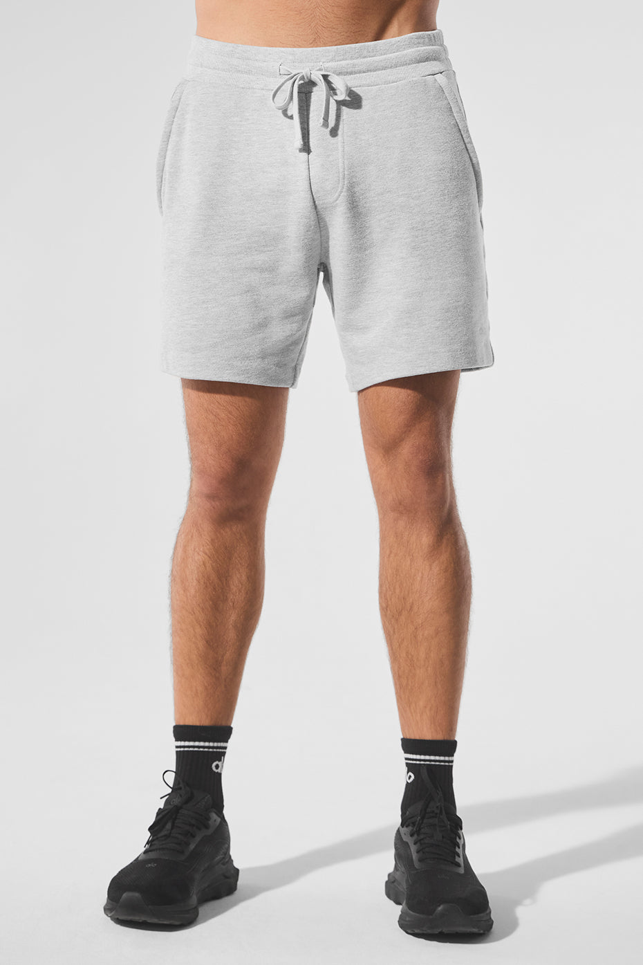 Close-up of men's lounge shorts fabric texture and drawstring detail