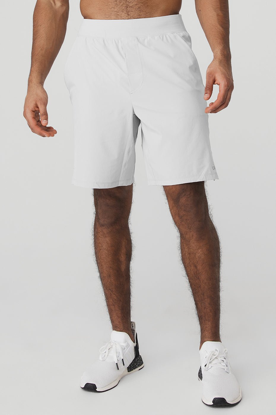 Front view of moisture-wicking shorts styled for athletic fit
