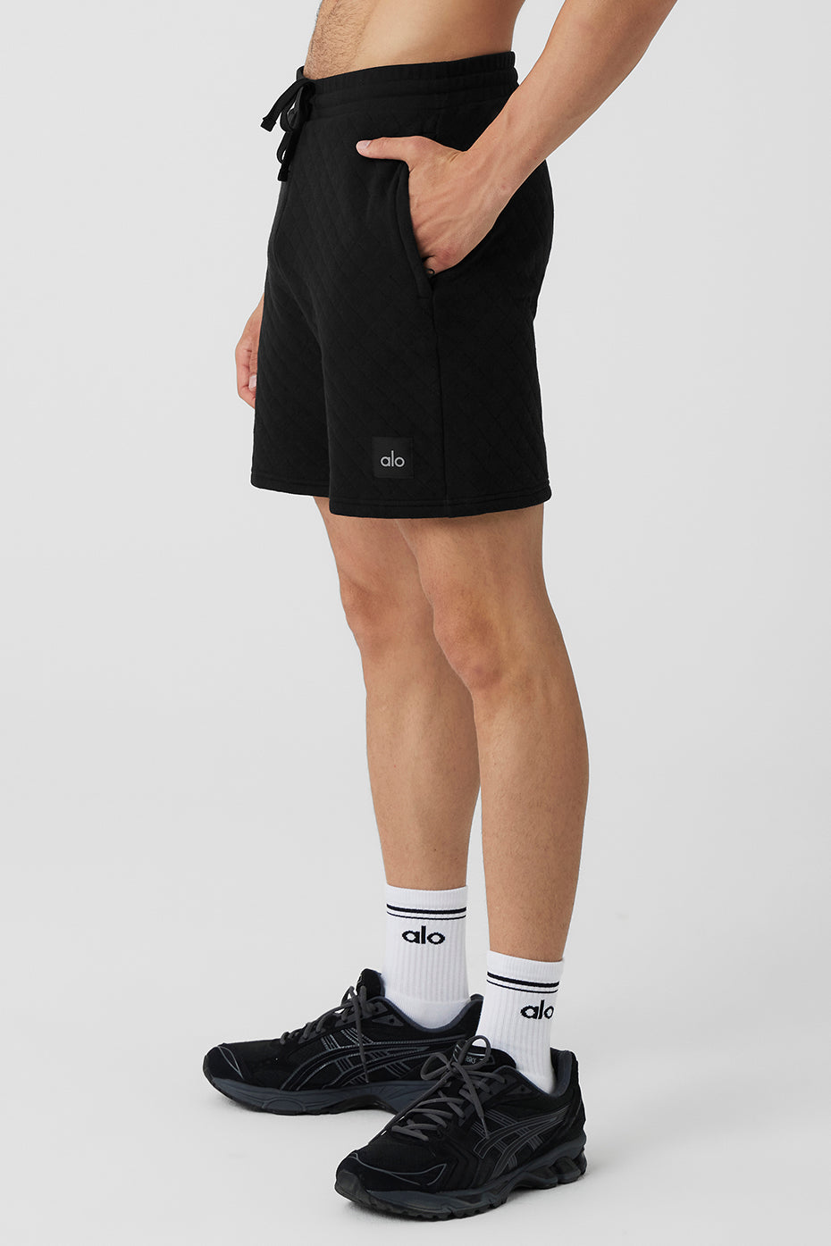 Close-up of moisture-wicking fabric texture on mens shorts