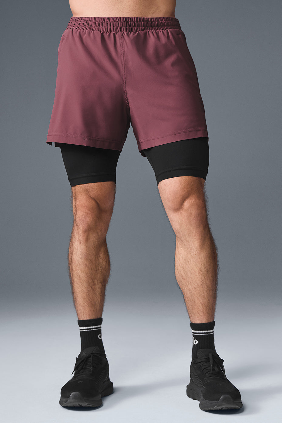 Close-up of the Revival running shorts' moisture-wicking fabric and compression liner