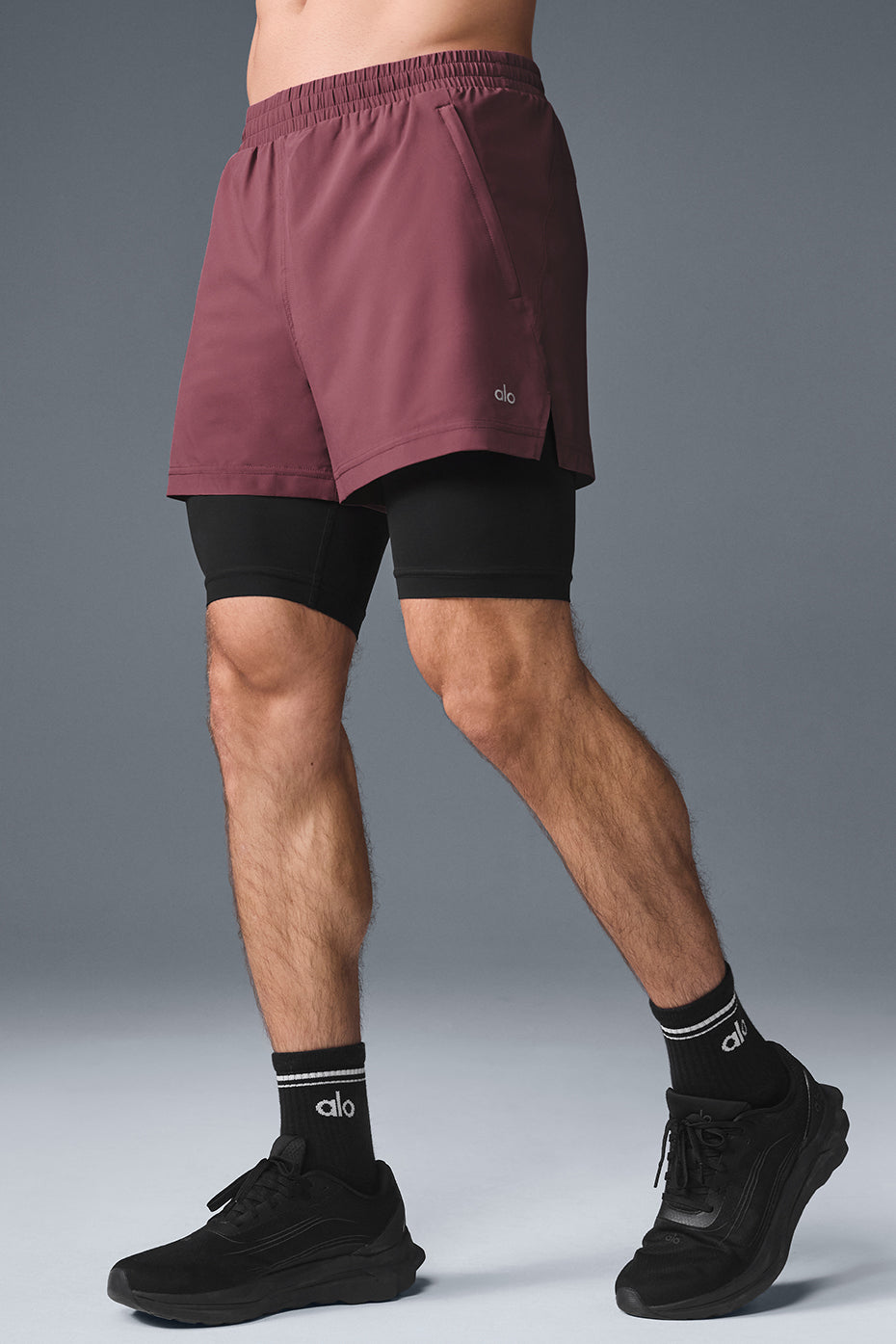 Side view highlighting zippered pockets and sleek waistband design