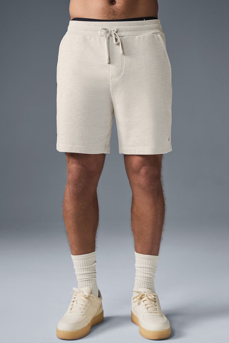 Side view of Oatmeal Heather loungewear shorts showing pockets.