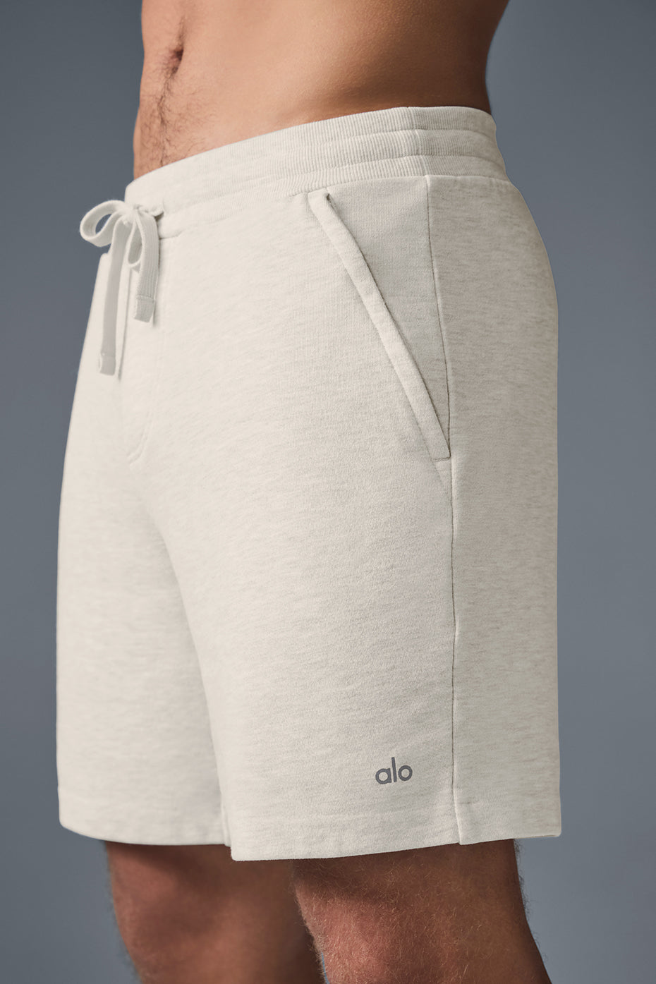 Model wearing comfortable shorts in a casual setting.