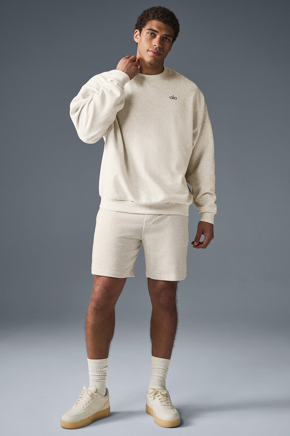 Side view of Oatmeal Heather loungewear shorts showing pockets.