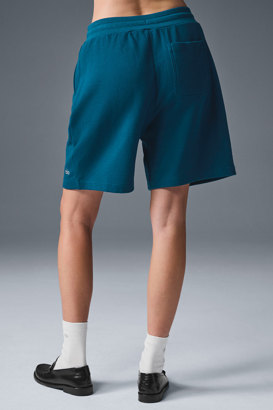 Side view of mens French terry shorts showcasing pockets and relaxed fit