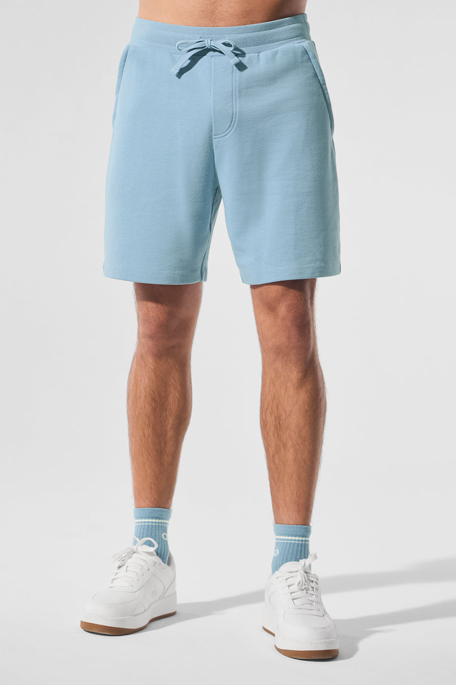 Front view of French terry shorts with drawstring waistband and side pockets