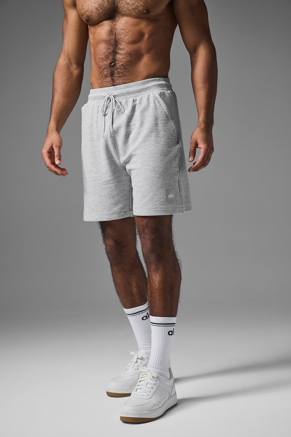 Side view of Micro Waffle Knit Shorts with zipper pockets, ideal for athletes in shorts.