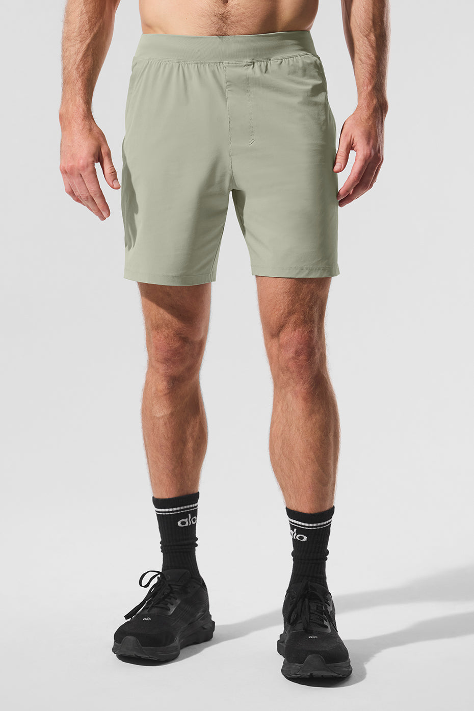 Side view of Limestone performance shorts, showcasing the elastic waistband and pockets.