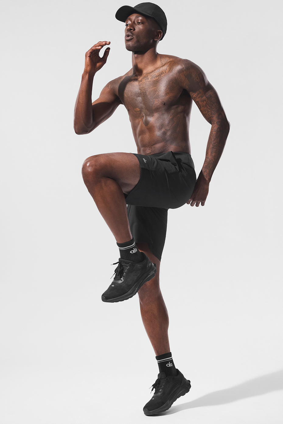 Athlete wearing black performance shorts during trail run