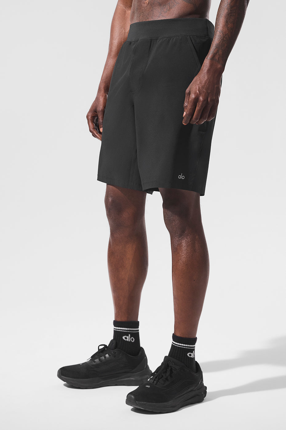Close-up of moisture-wicking fabric texture on mens athletic shorts