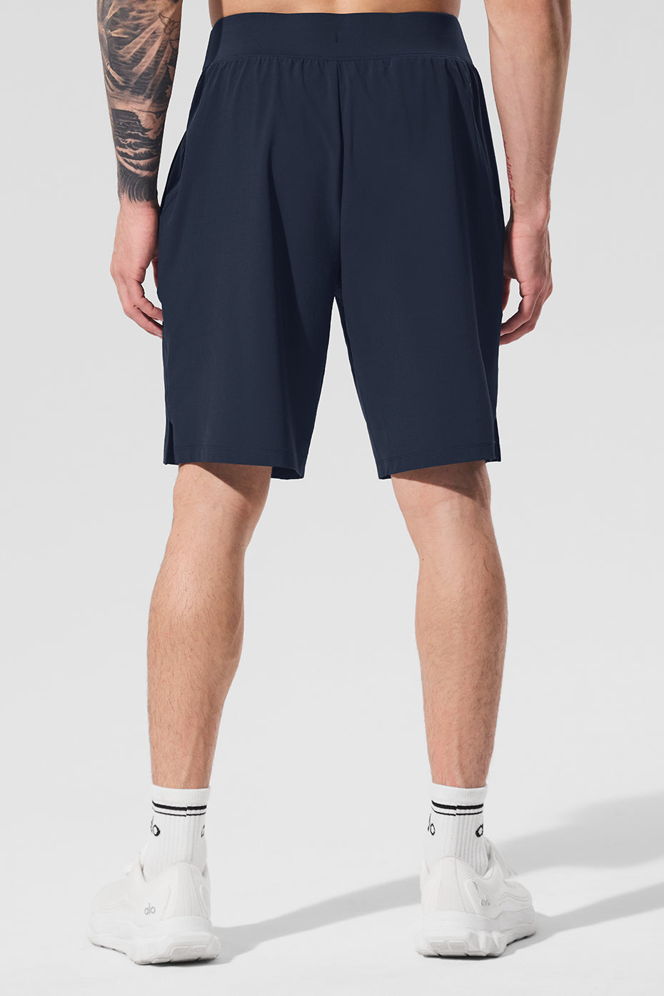 Athlete wearing moisture-wicking shorts during trail run in Pacific Northwest