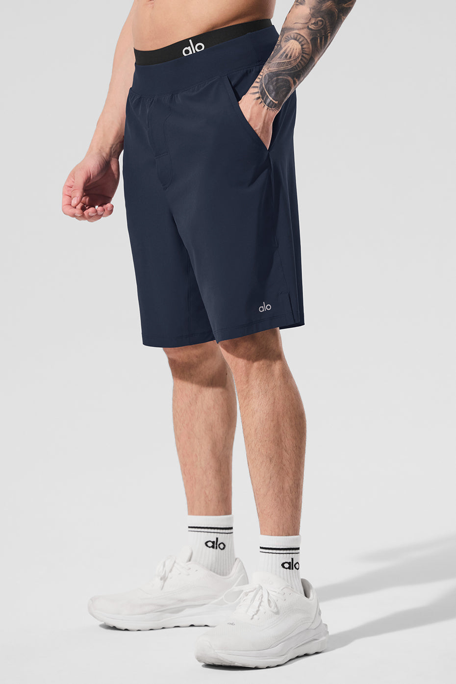 Detail shot showing pockets on mens athletic shorts with drawcord adjustment