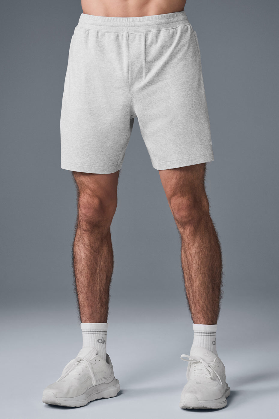Front view of men's workout shorts in heather grey, showing streamlined fit