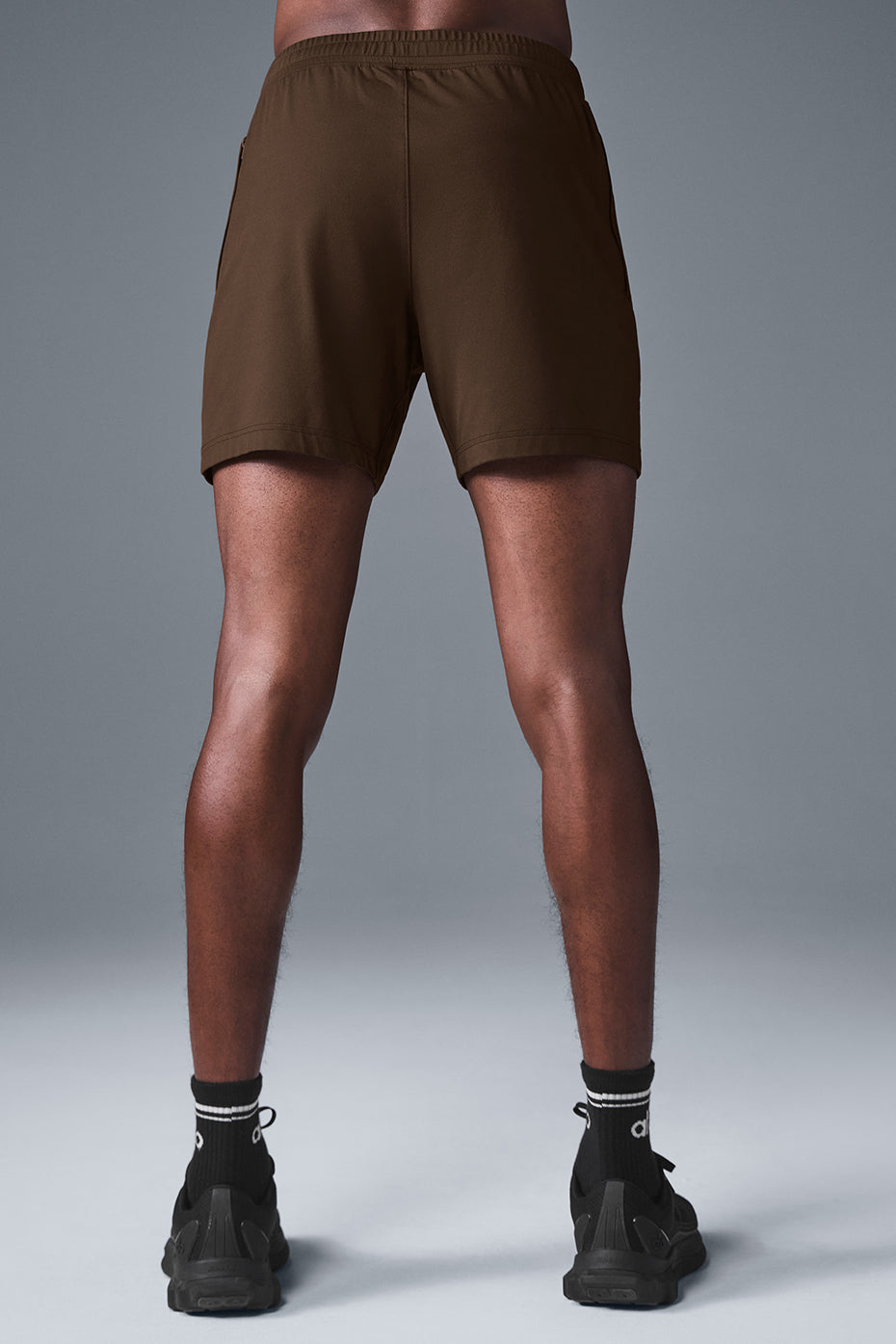 Side view showcasing the lightweight fabric of mens performance shorts.
