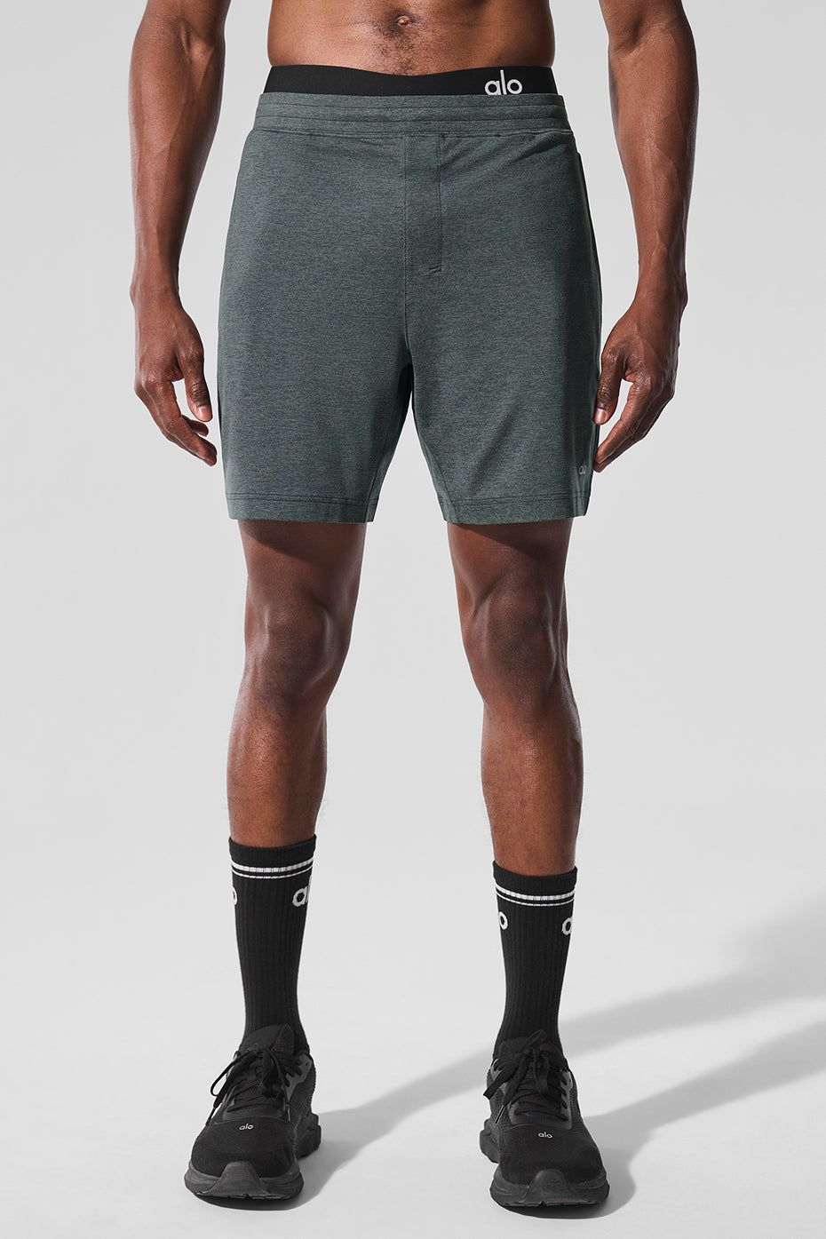 Close-up of Conquer React performance shorts fabric and stitching detail