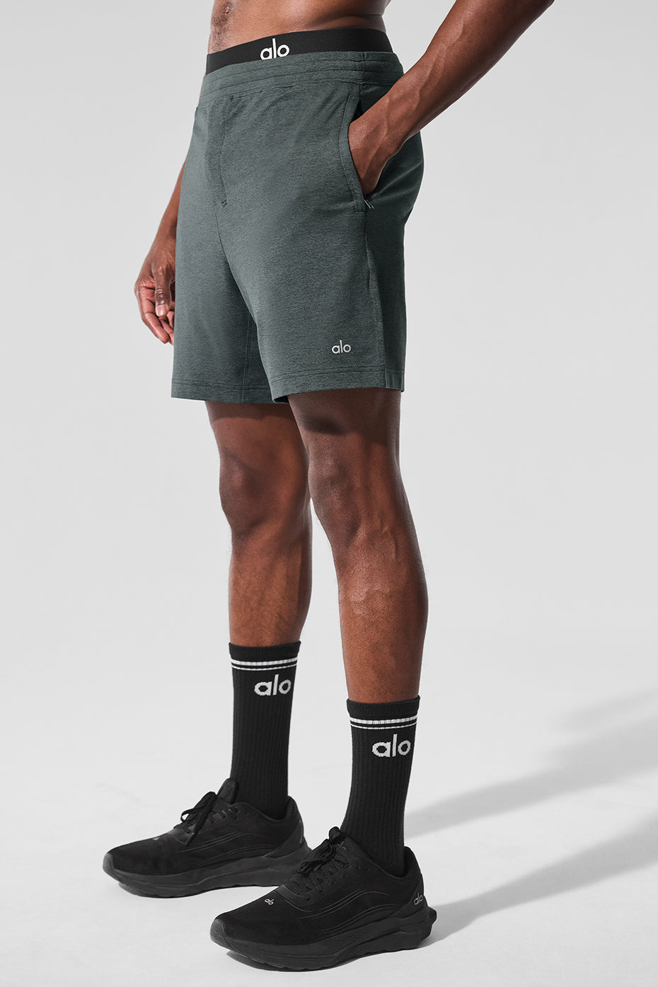 Close-up of Conquer React performance shorts fabric and stitching detail