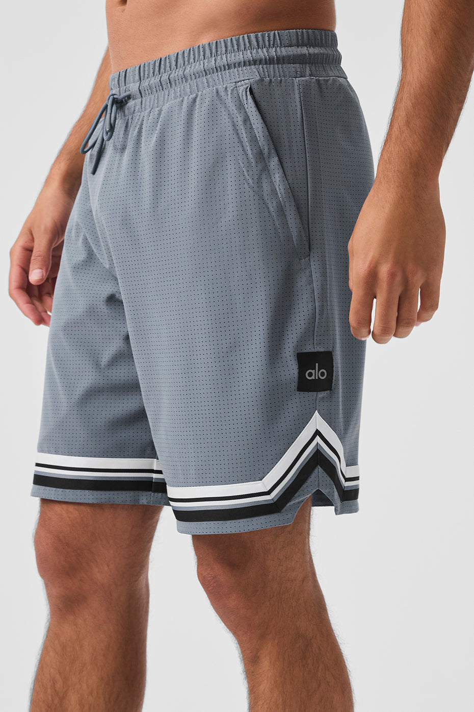 Close-up of elastic waistband and drawcord on womens athletic shorts