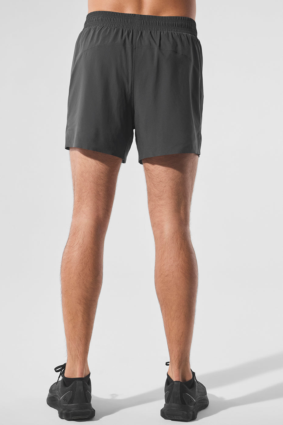 Close-up of waistband and drawcords highlighting fit and function in mens athletic shorts.