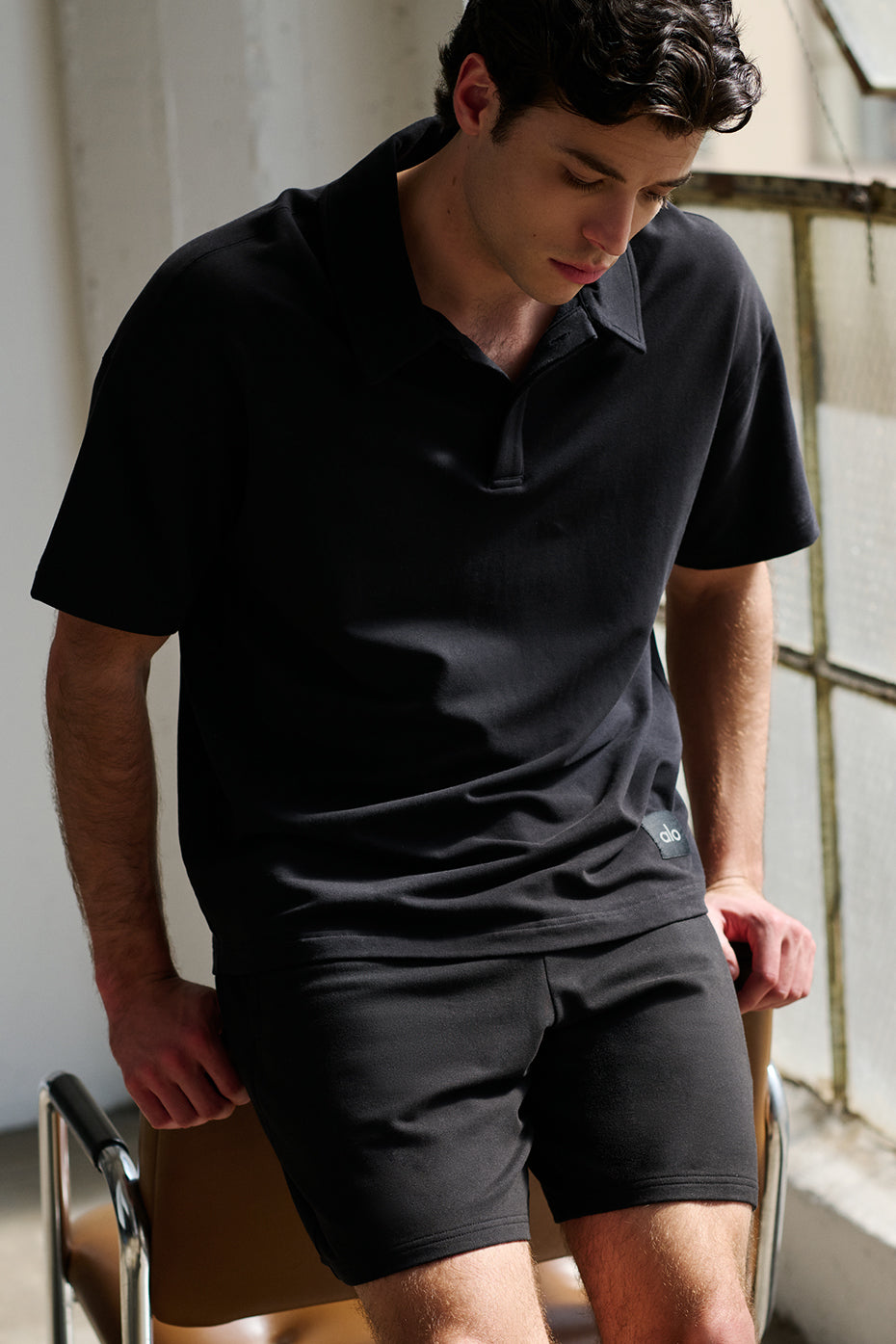 Jet black shorts paired with white sneakers, ideal for relaxed mornings in Sacramento neighborhoods.
