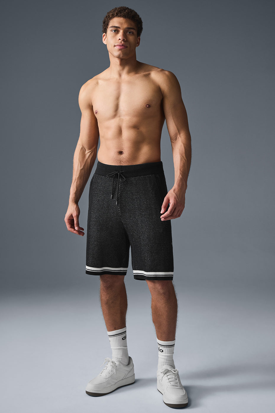 Front view of black 7-inch basketball shorts for men, showcasing the relaxed fit.