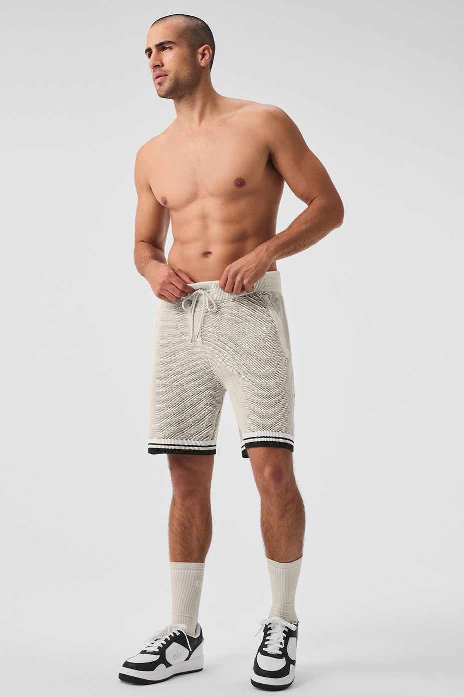 Front view of 7-inch bone sports club basketball shorts, showcasing the relaxed fit.