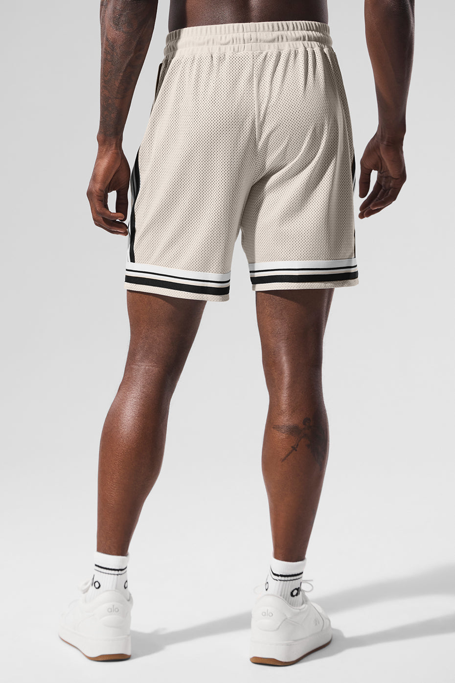 Close-up of contrasting trim on comfortable workout shorts.