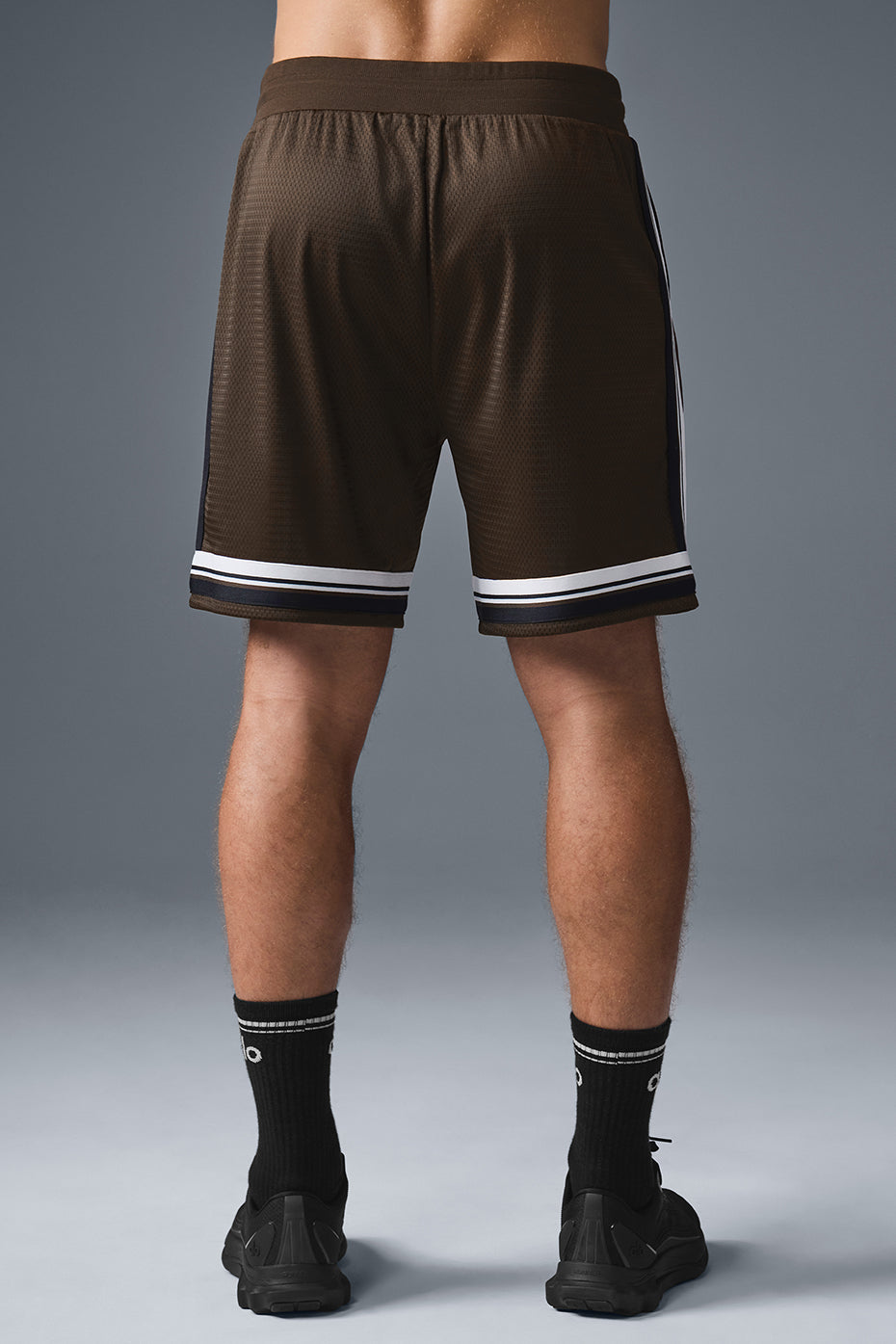 Side view of breathable basketball shorts for men during a game