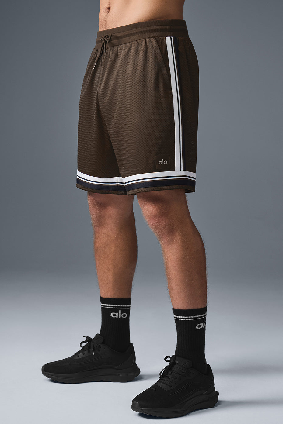 Relaxed fit basketball shorts showcased with pockets