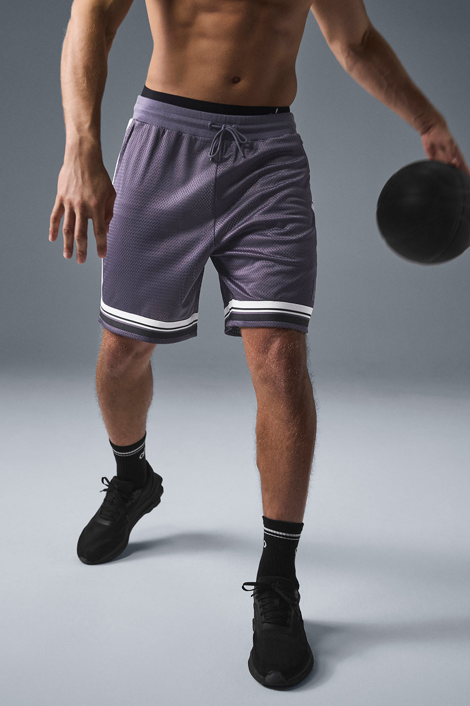 Front shot of lightweight performance athletic shorts with stylish details and functional pockets.