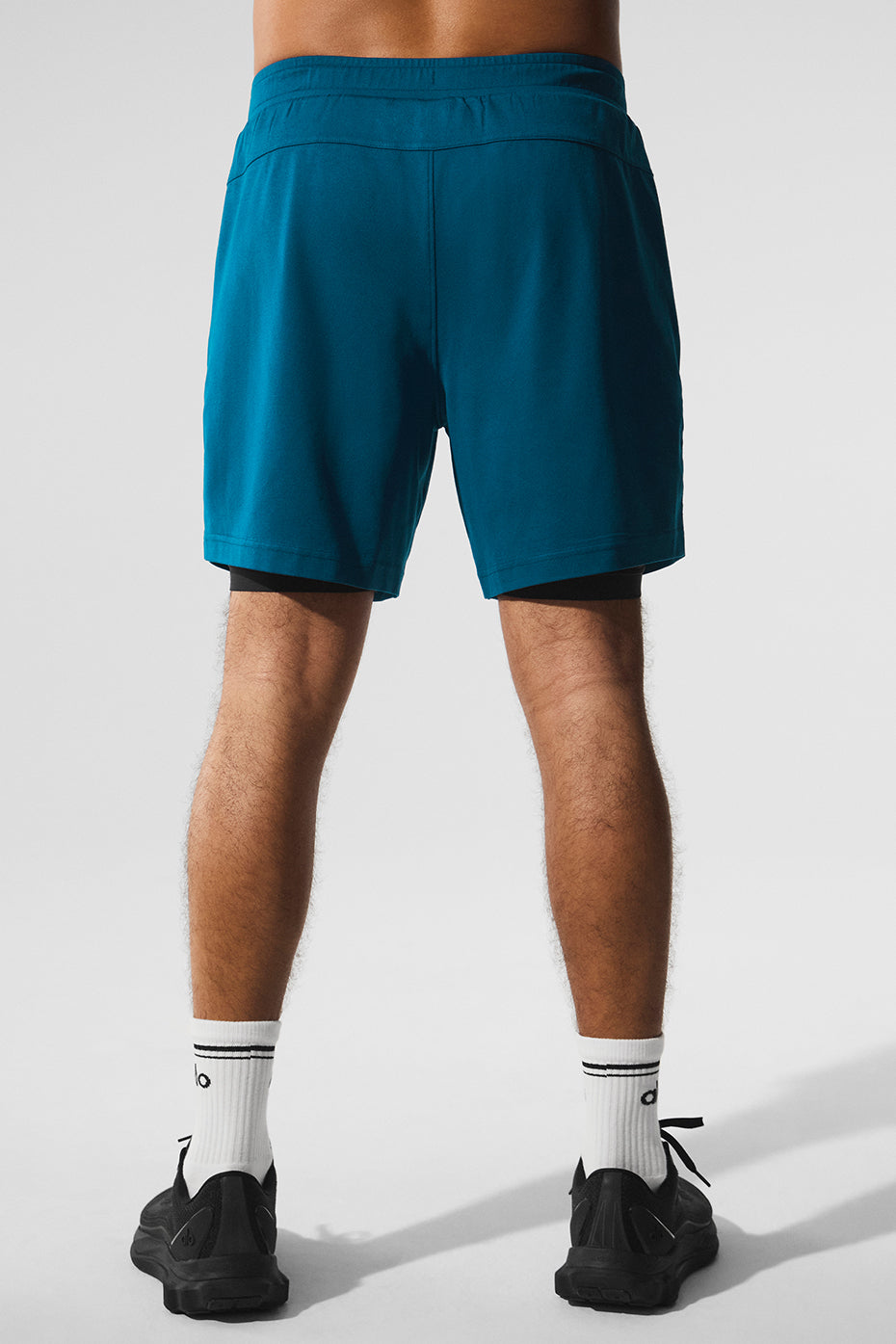 Athlete wearing 2-in-1 workout shorts during training session
