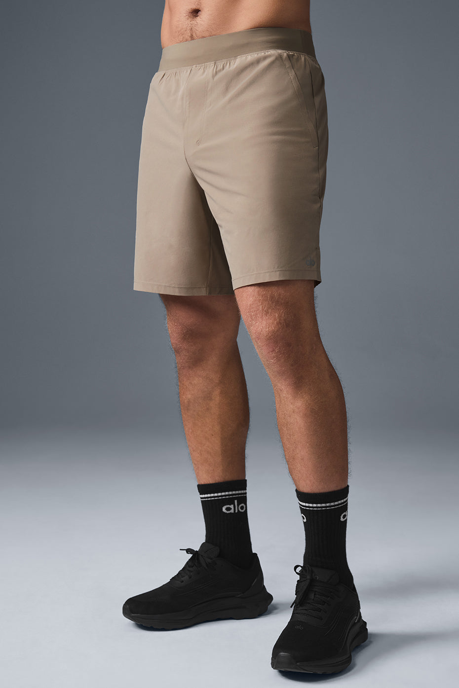 Gravel performance shorts showcasing moisture-wicking fabric and zip pockets.
