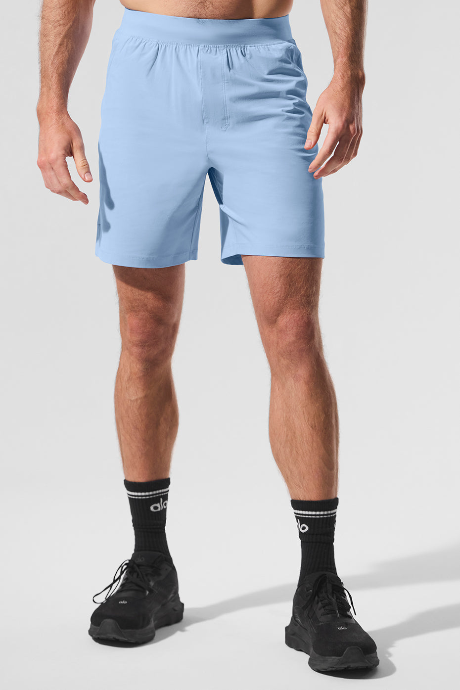 Seashell blue men's performance shorts with zip pockets, perfect for fishing.