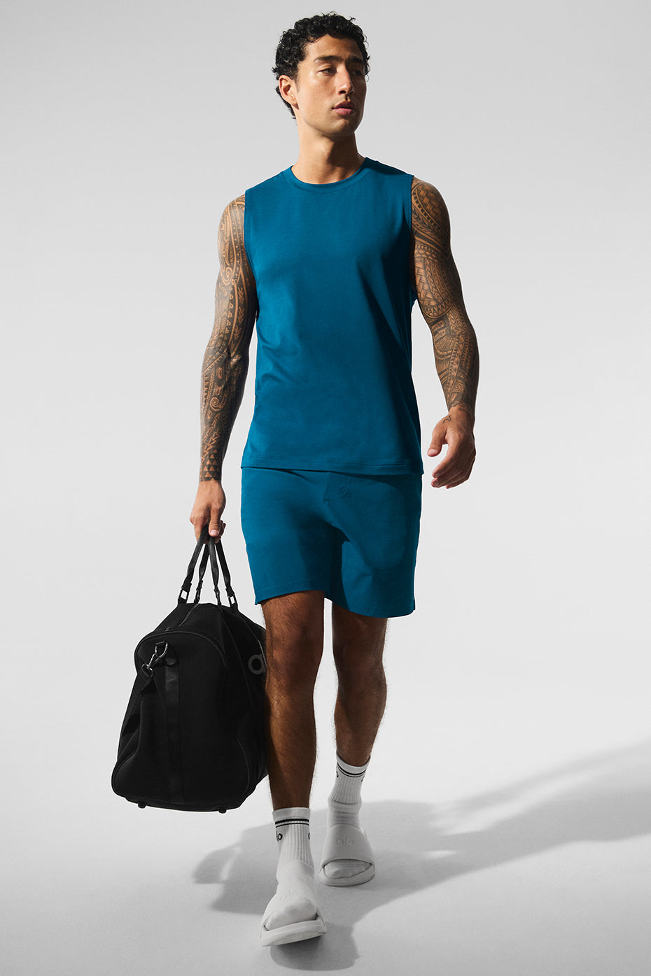 Side view highlighting the moisture-wicking fabric of mens athletic shorts.