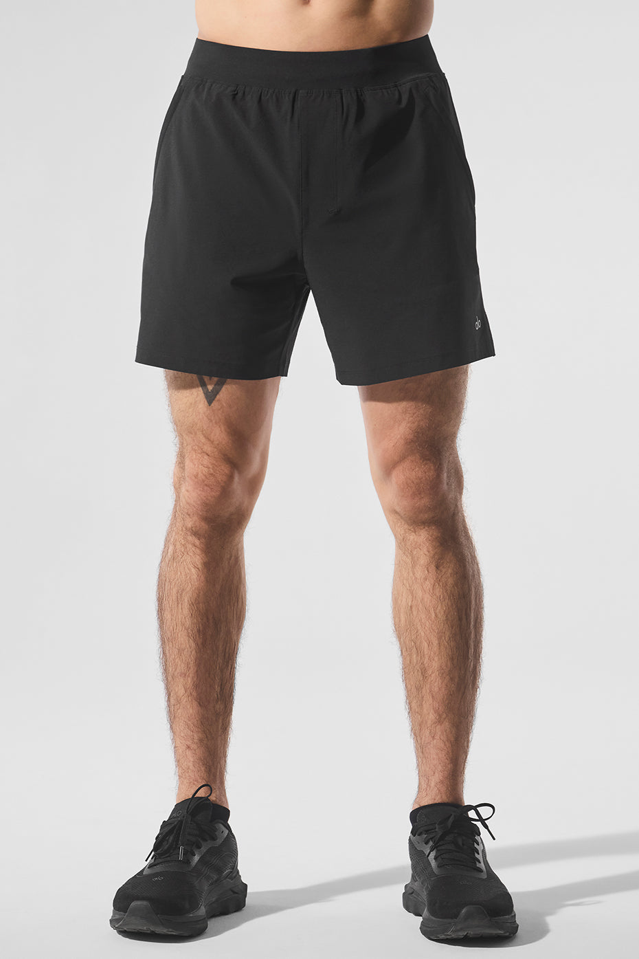 Front angle view of men's athletic shorts during a workout