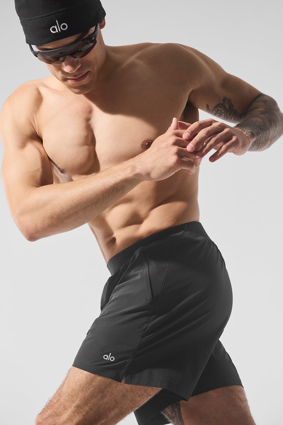 Front angle view of mens 5 inch inseam shorts showing fit and texture