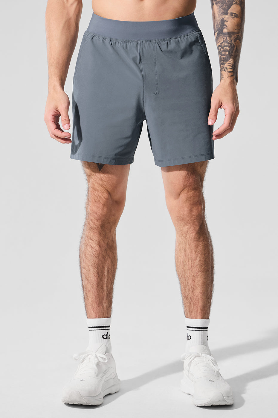 Front view of Steel Grey 5-Inch Fitness Shorts on a model during a workout.