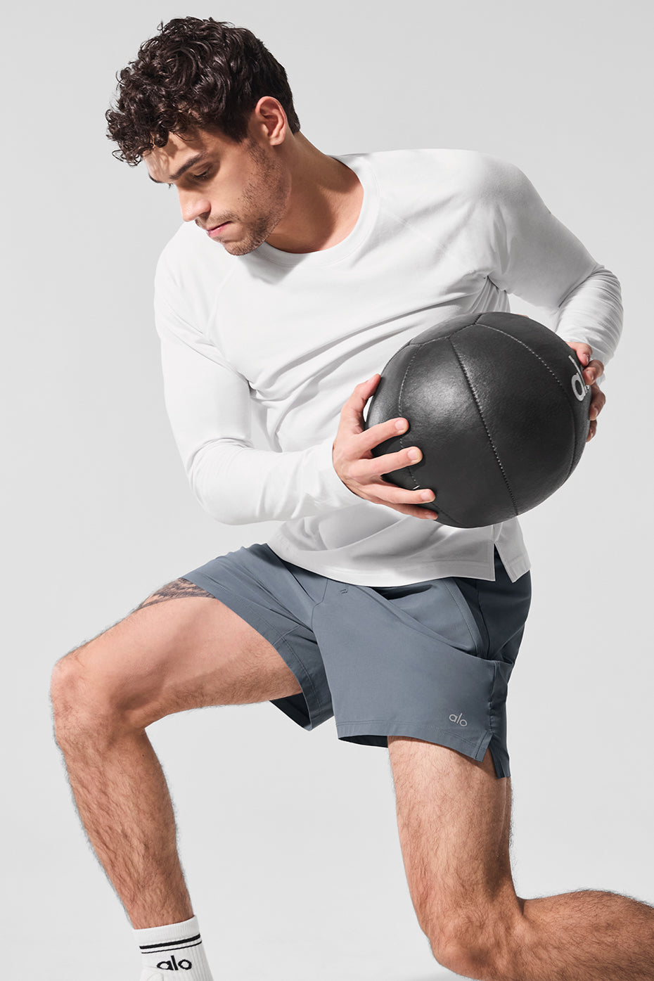 Side angle of Steel Grey athletic shorts, showcasing the fit and design.