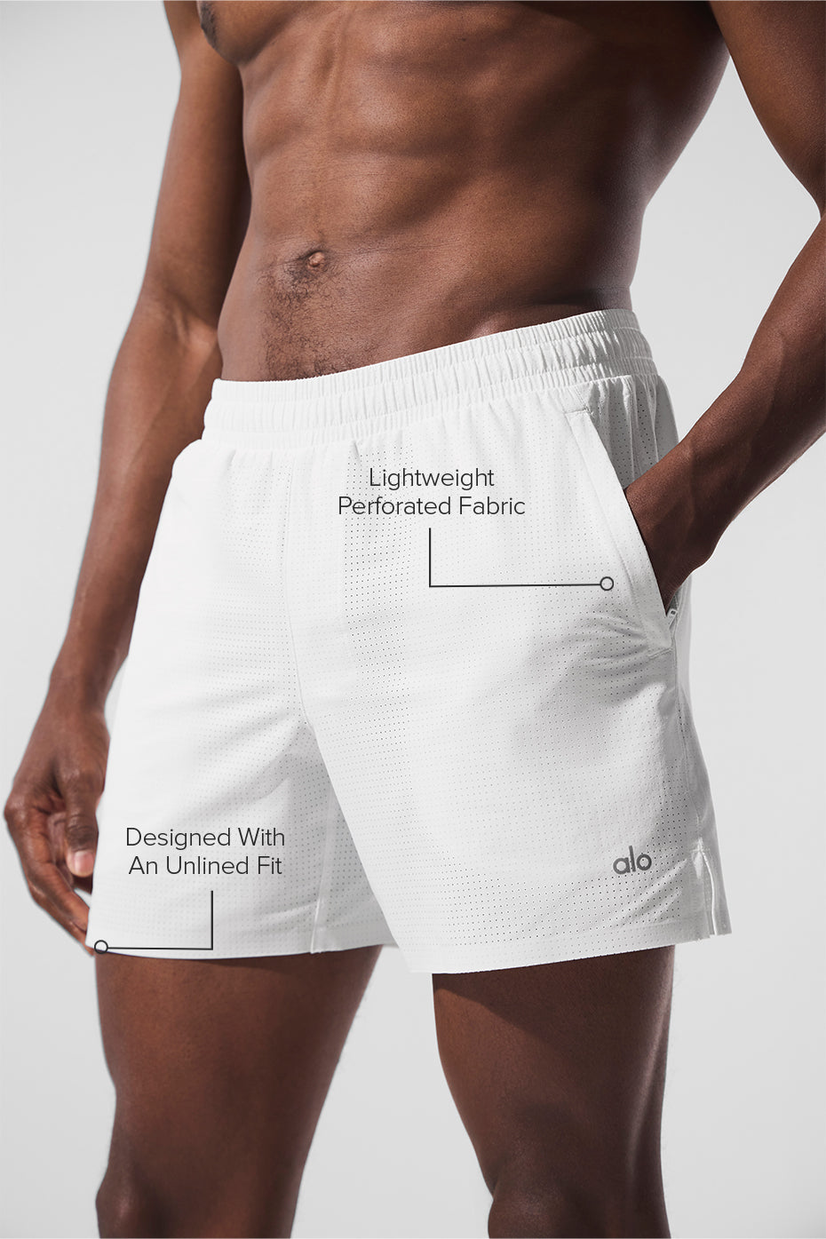 Side view showcasing the zippered pockets of mens running shorts.