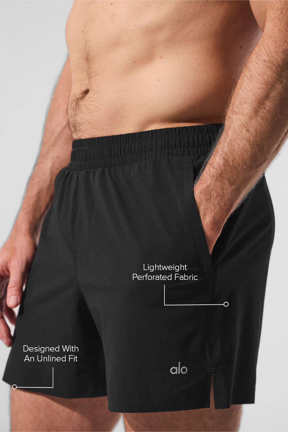 Side view of mens athletic shorts with zippered pockets, perfect for training.