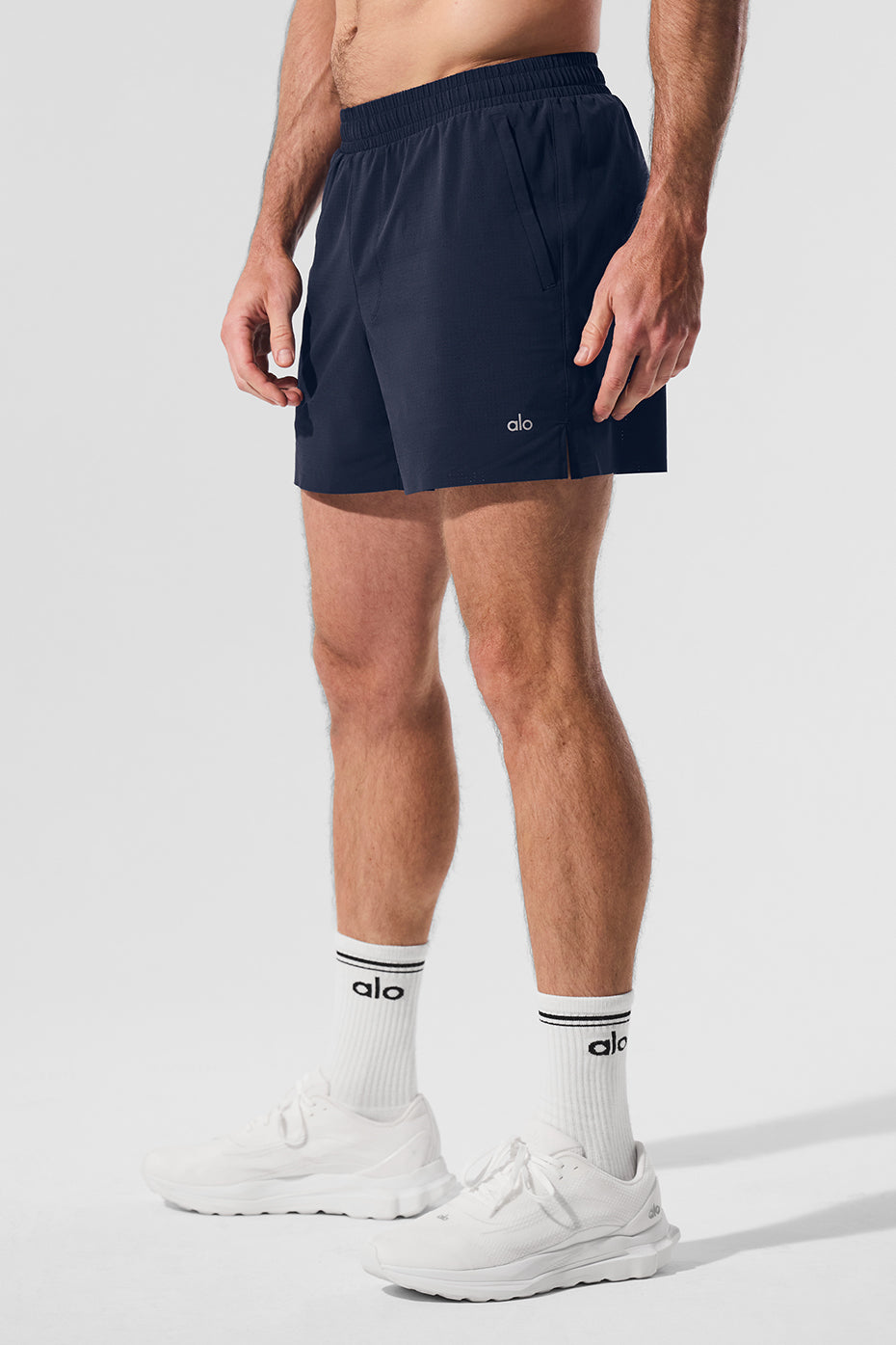 Front view of navy 5-inch traction running shorts for men, showcasing breathable fabric.