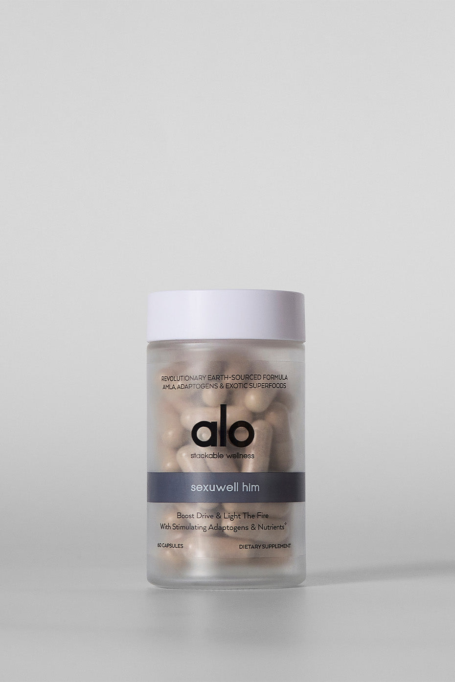 Close-up of Sexuwell Him supplement bottle highlighting endurance boosters