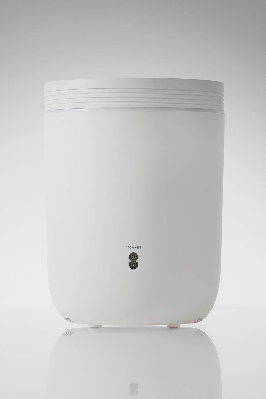 White Aura diffuser with mist coming out, ideal for home aromatherapy