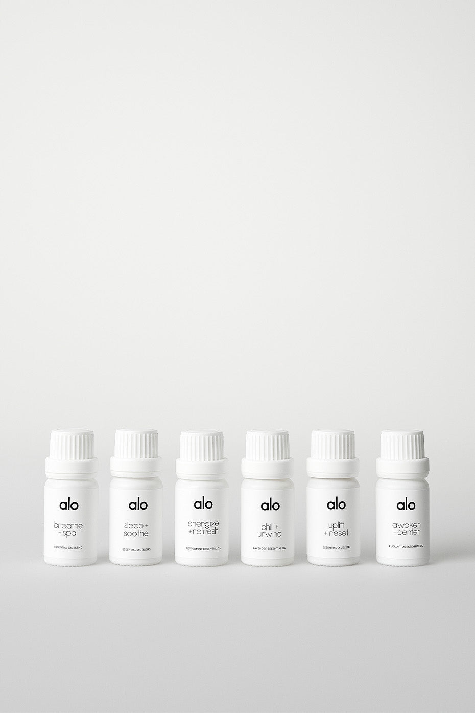 Person diffusing essential oils during a calming massage or meditation session