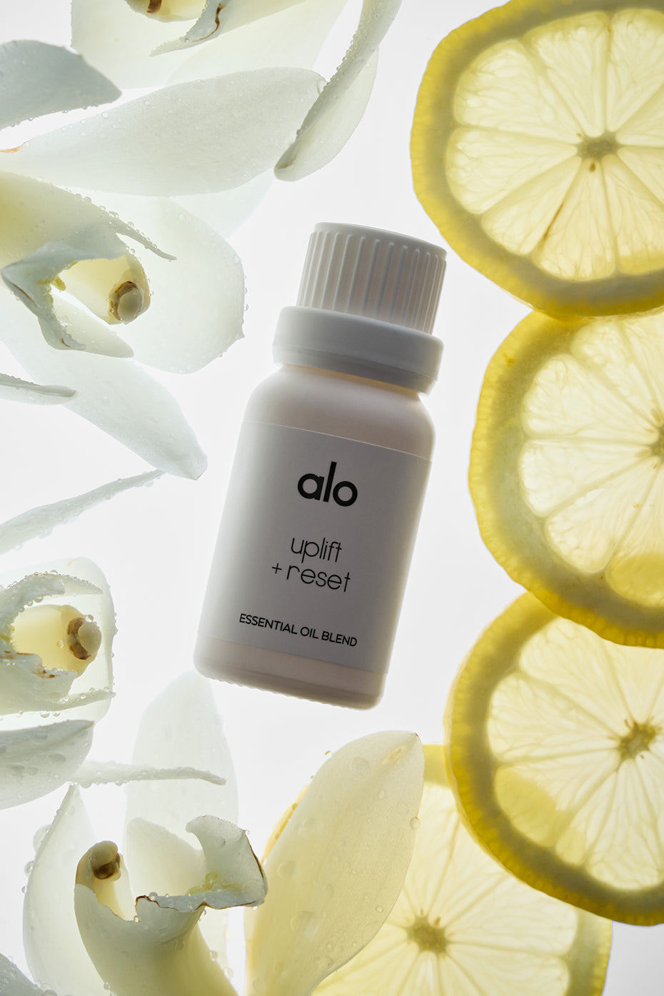 Revive blend bottle styled near yoga mat for aromatherapy