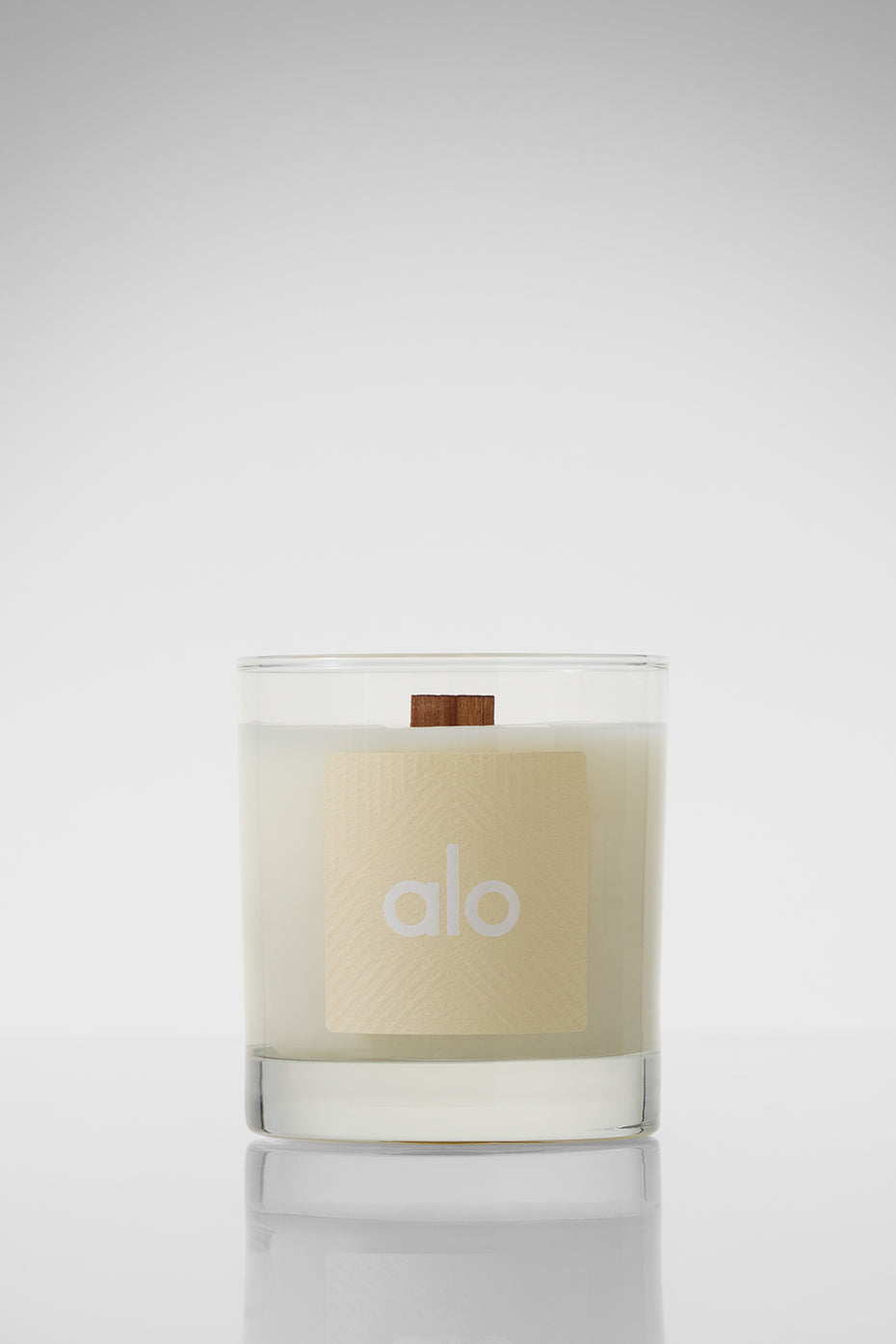Close-up of the ALO Santal Candle, highlighting its elegant design and warm ambiance.