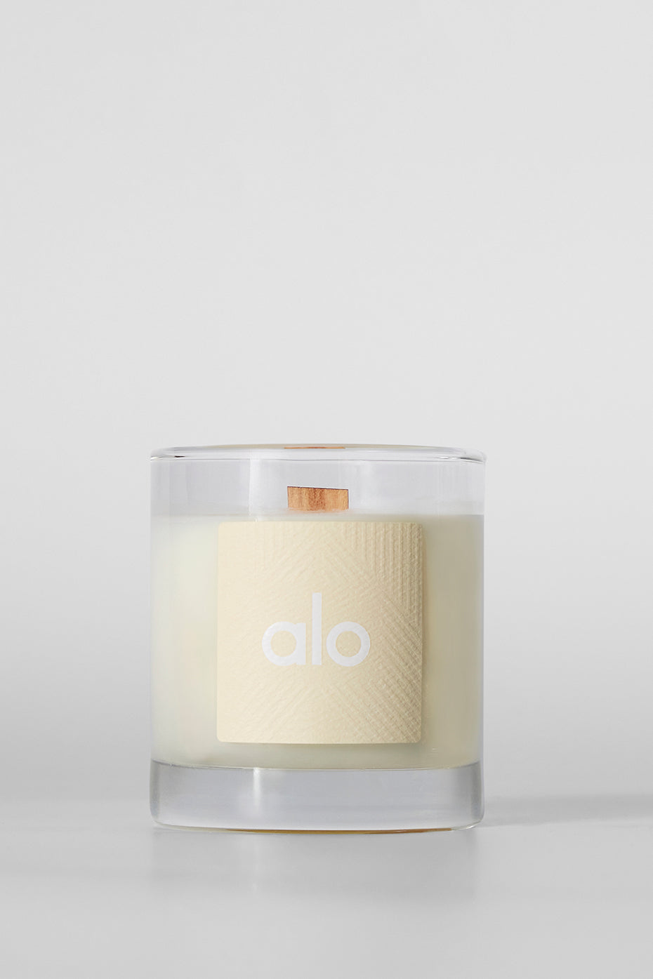 Close-up of ALO Love Candle showcasing its floral scent and design.