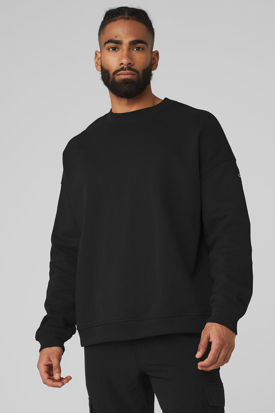 Front view of the oversized heavyweight crew neck pullover in black.